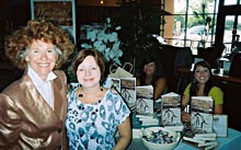 Hilda with a happy reader and great Brown Books helpers.